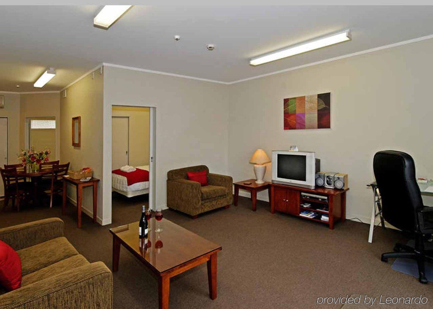 Kudos Business Suites & Airport Motel Auckland Habitación foto