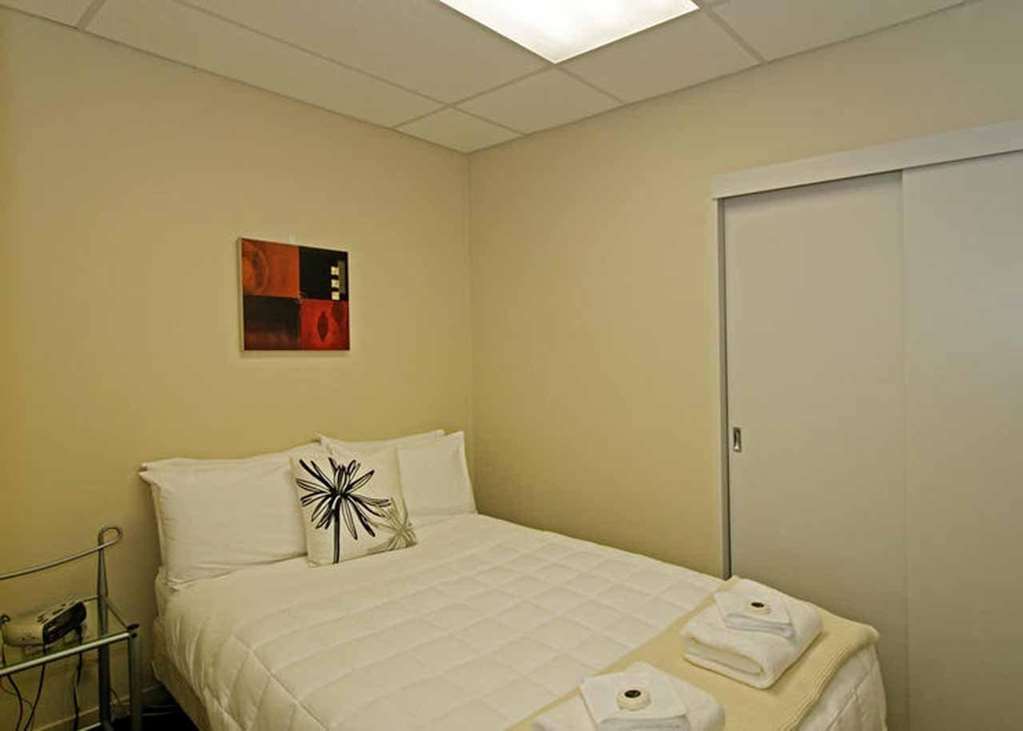 Kudos Business Suites & Airport Motel Auckland Habitación foto